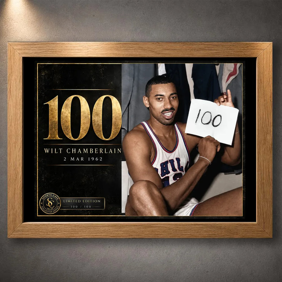 Oak framed Wilt Chamberlain basketball wall art featuring the 100 tribute design for a warm collector display.