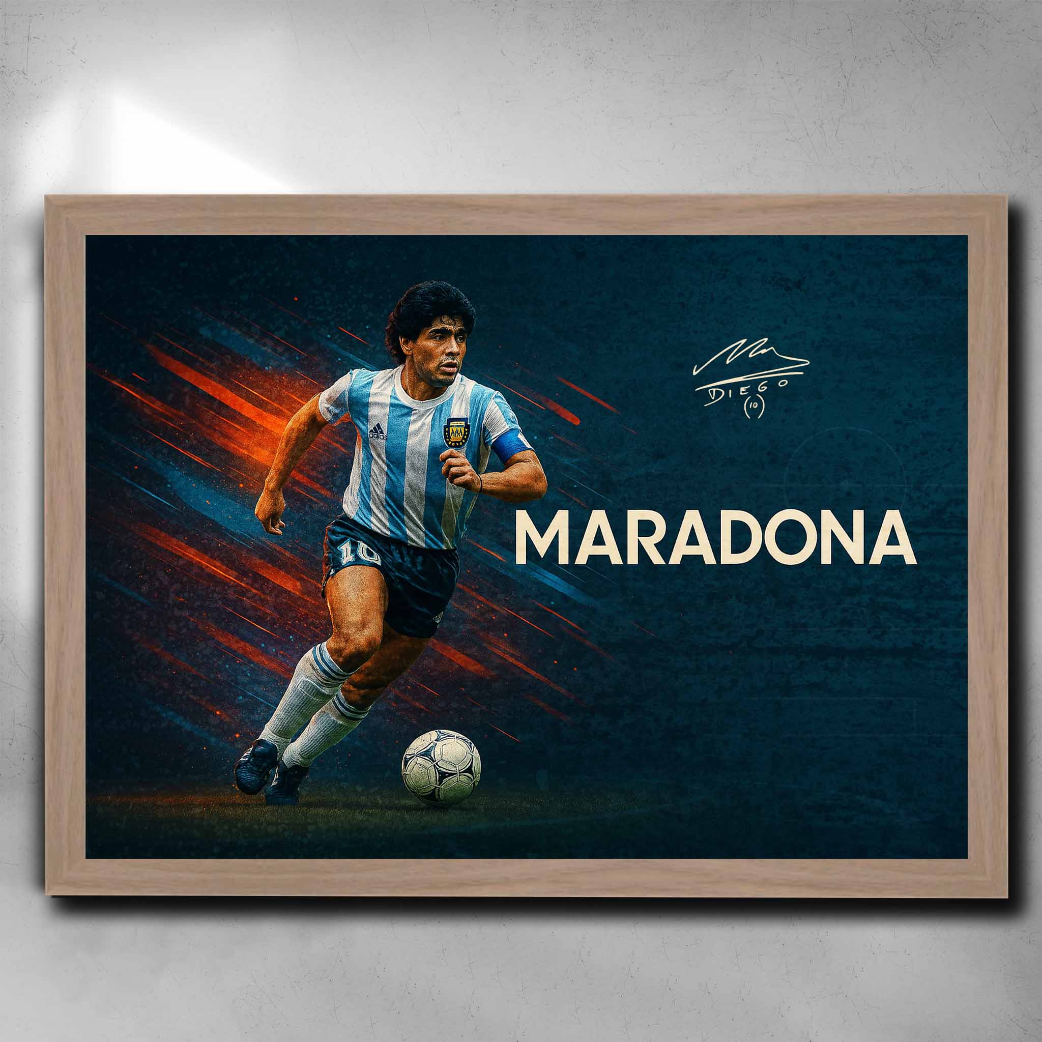 Oak framed soccer art featuring a signed print of the legendary Diego Maradona playing for Argentina - Artwork by Sports Cave.