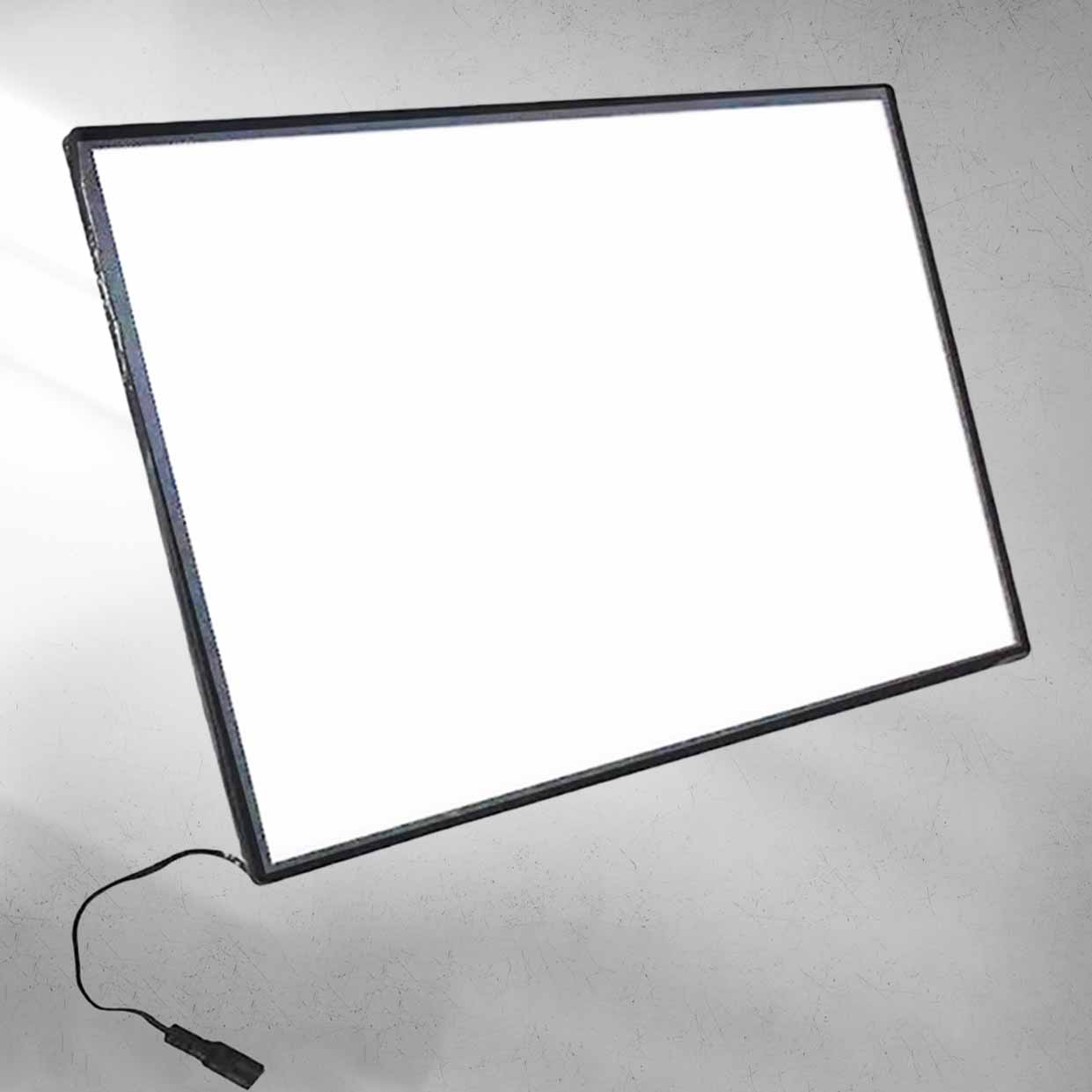 Ultra-slim LED poster box with power cord shown, ideal for lighting up framed sports prints or wall displays with a bright, even glow.