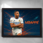Framed Kylian Mbappé Real Madrid wall art with arms-crossed celebration, explosive background, and Champions League detail.