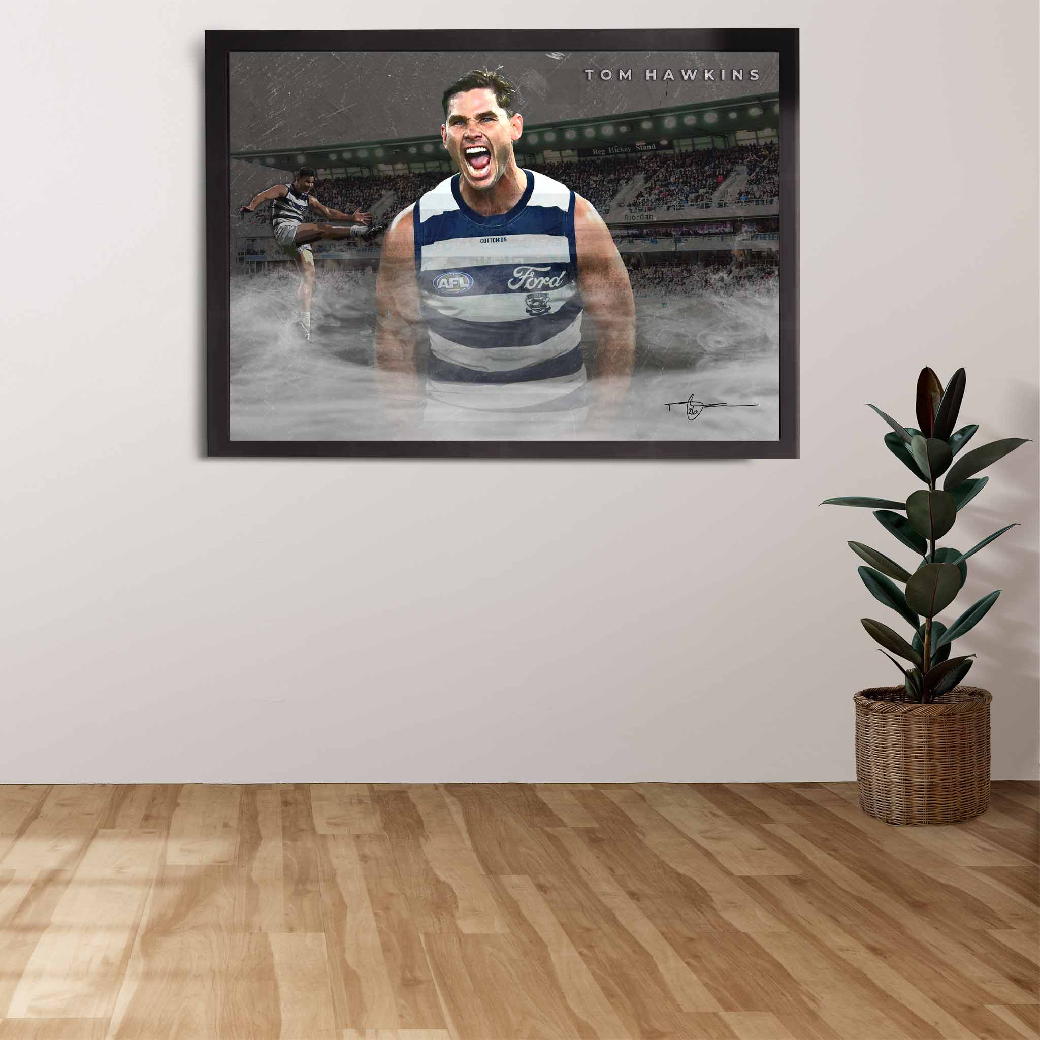 AFL Die-hard Supporters House, featuring a framed print of Tom Hawkins showcased on the wall.