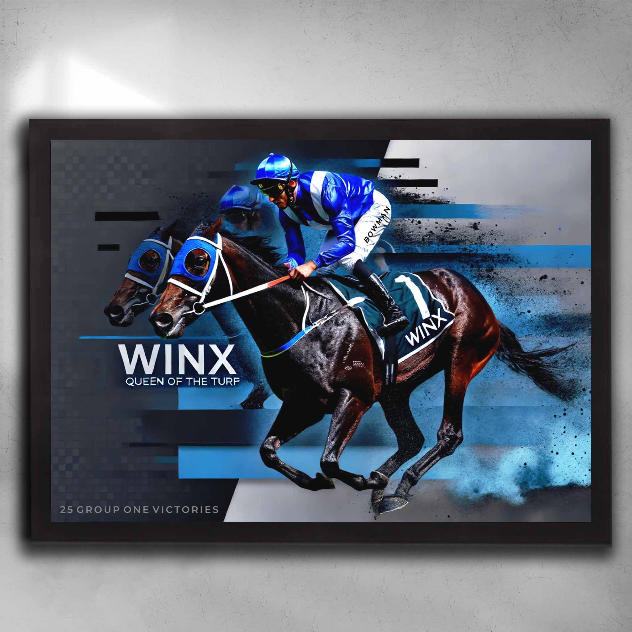 Framed Winx horse racing wall art featuring iconic blue silks, motion-streak design, and tribute to 25 Group 1 victories.
