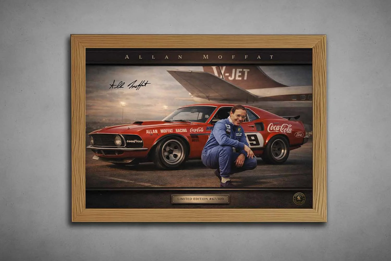 Oak framed Allan Moffat motorsport print showcasing a classic racing moment, ideal for refined man cave wall décor.