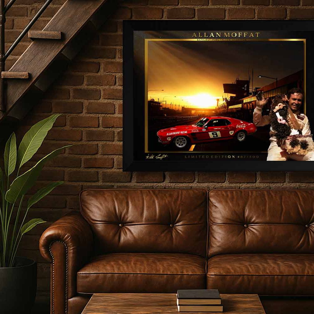 Framed sports wall art of Allan Moffat in a man cave setting, perfect for collectors of premium sports memorabilia.