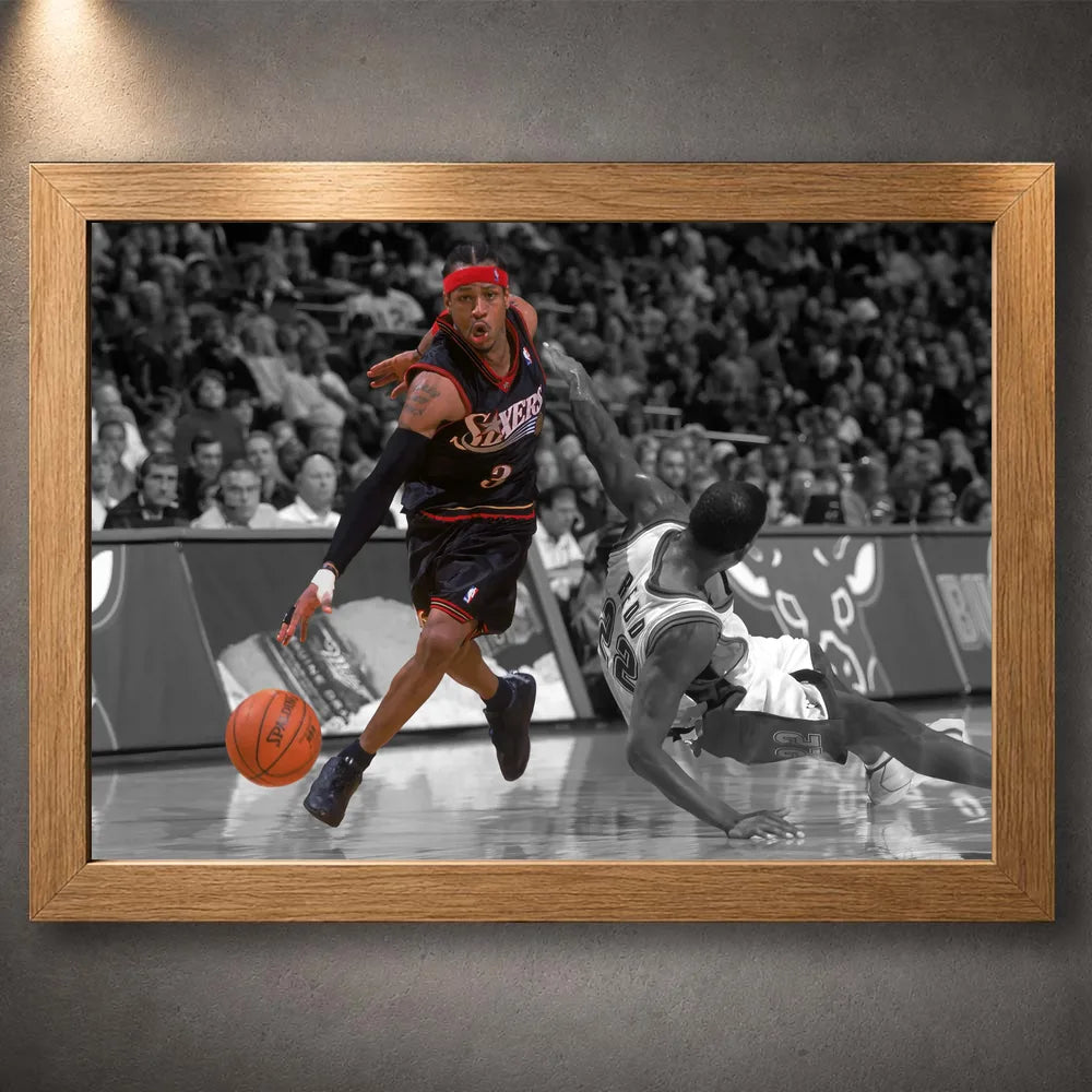 Oak framed Allen Iverson basketball print showing the crossover moment against a fallen defender.