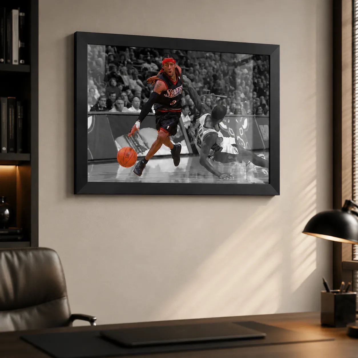 Allen Iverson crossover wall art in a black frame on an office wall beside a desk and leather chair.