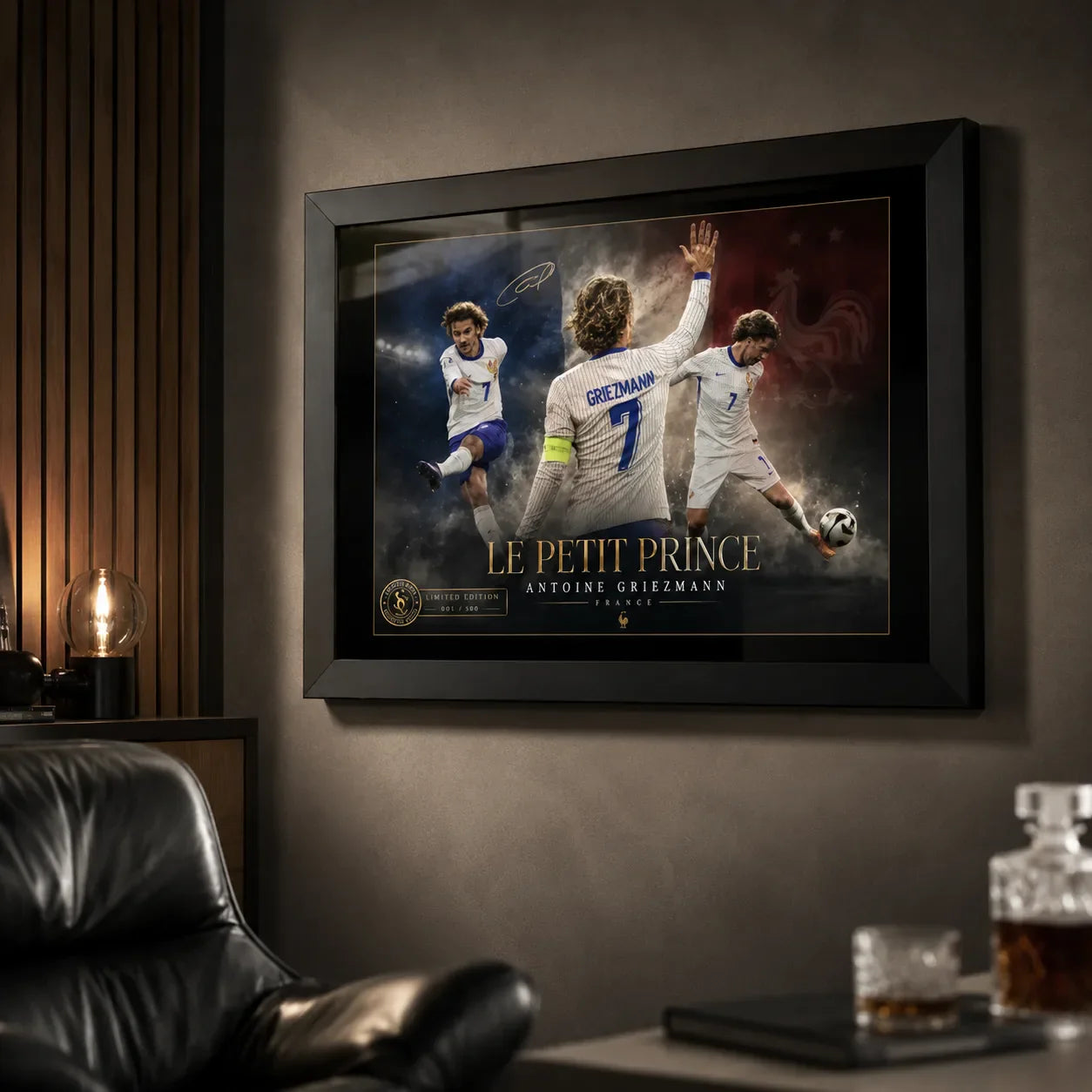 Antoine Griezmann framed soccer wall art shown on a dark man cave wall with lounge chair and bar styling.
