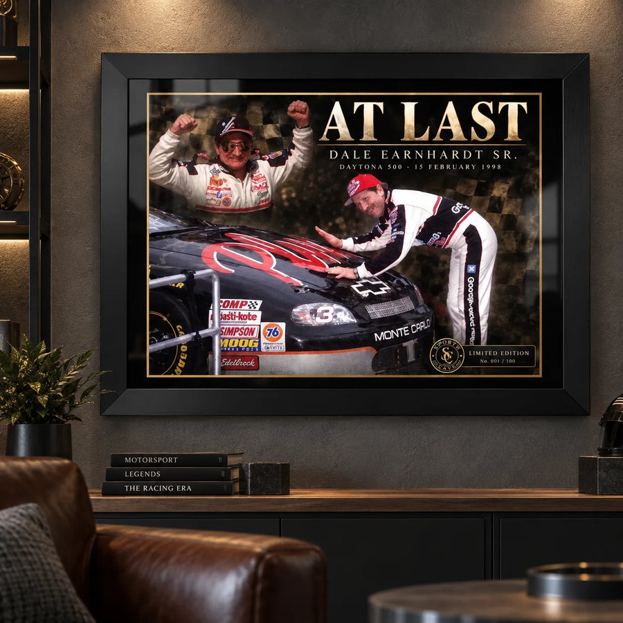 Dale Earnhardt Sr. At Last wall art displayed in a dark motorsport-inspired man cave setting.