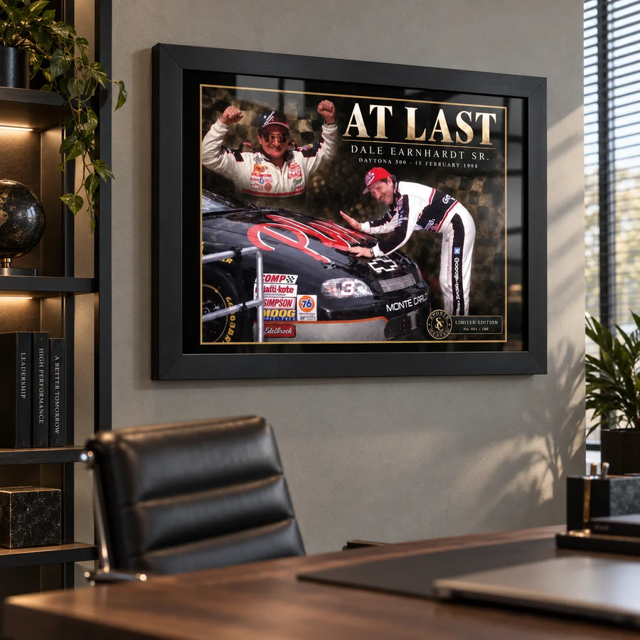 Dale Earnhardt Sr. NASCAR wall art displayed in a modern office with a black frame.