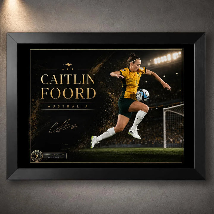 Black framed Caitlin Foord soccer wall art featuring her in Australia colours against a stadium backdrop.