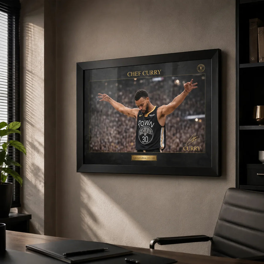 Chef Curry basketball wall art displayed in a minimal office with a black frame on a textured wall.