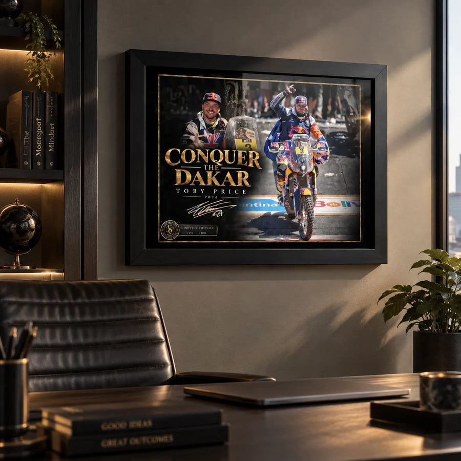 Toby Price Dakar wall art displayed in a modern office above a desk with warm ambient lighting.