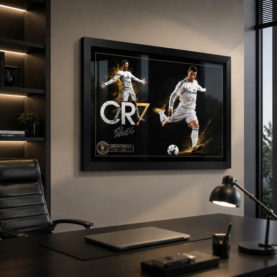 Black-framed Cristiano Ronaldo CR7 soccer wall art mounted above a desk in a modern executive office.