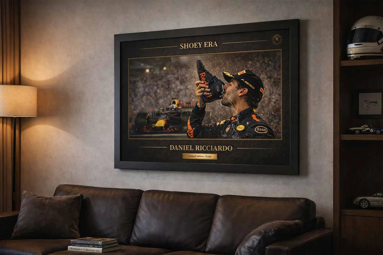 Daniel Ricciardo Shoey Era black framed artwork displayed above leather sofa, framed sports memorabilia.