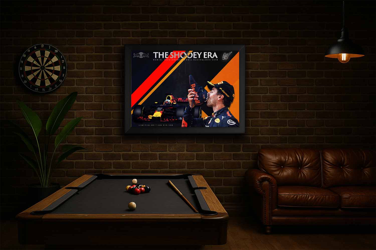 Daniel Ricciardo framed sports memorabilia print displayed in a man cave setting, featuring his iconic Red Bull Racing shoey moment.