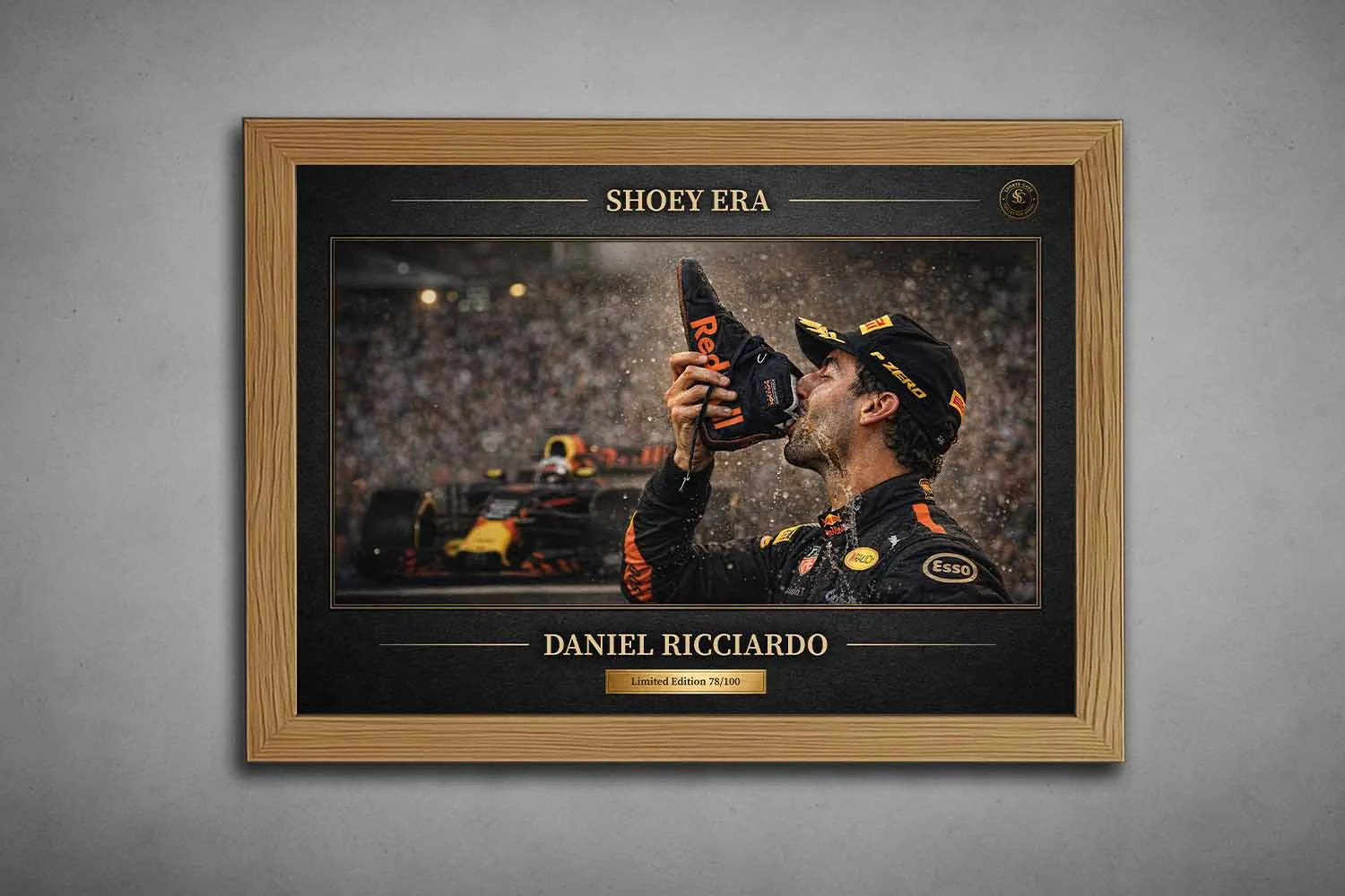 Oak framed Daniel Ricciardo Shoey Era celebration print featuring podium champagne moment, framed sports art.