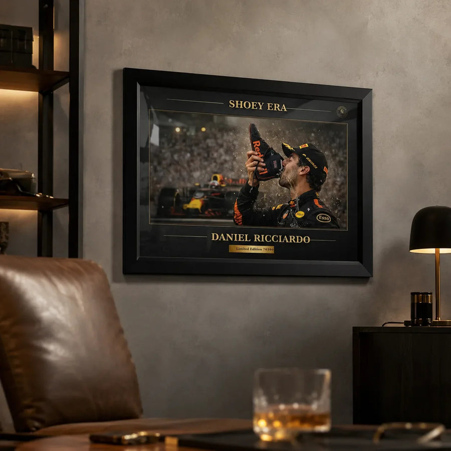 Daniel Ricciardo Shoey Era framed sports memorabilia styled in a dark man cave for loyal Australian racing fans.