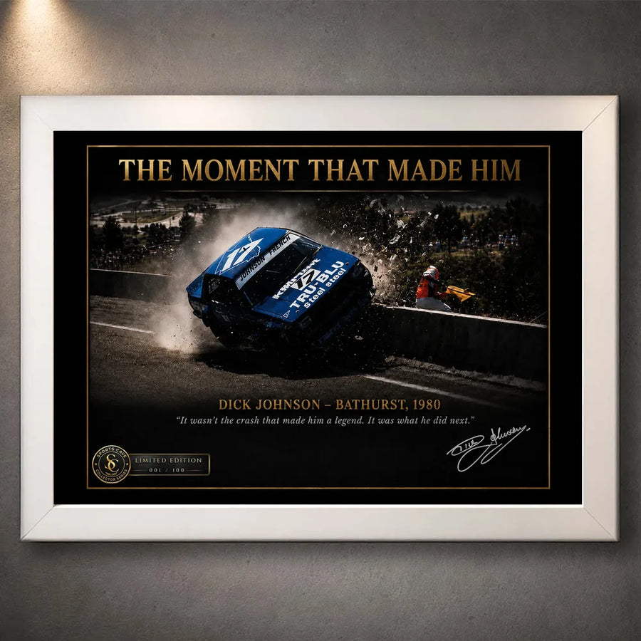 White framed Dick Johnson Bathurst 1980 motorsport wall art displayed against a softly lit grey textured wall.