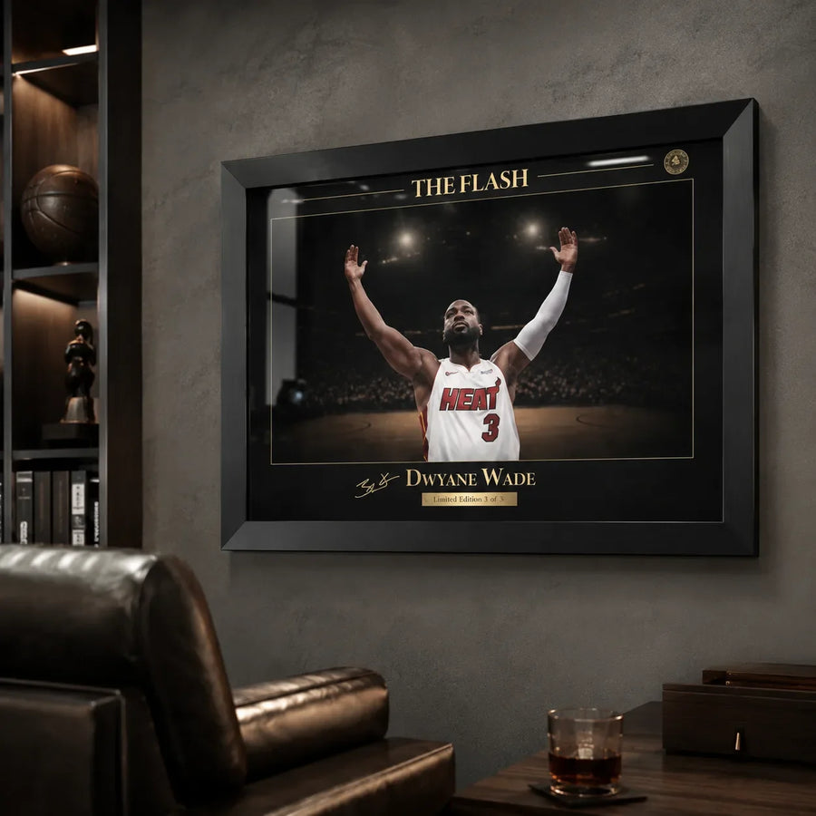 Black framed basketball wall art displayed in a premium man cave with shelving and dark textured wall.