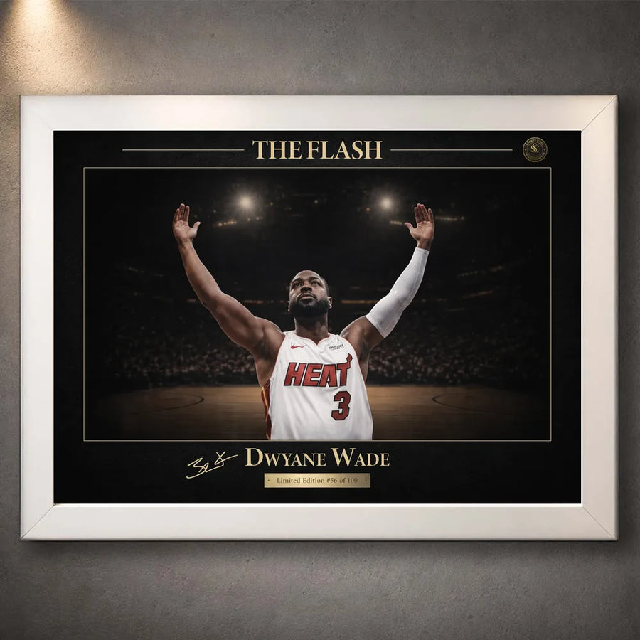 White framed basketball wall art with gold typography, arena lighting and textured wall backdrop.
