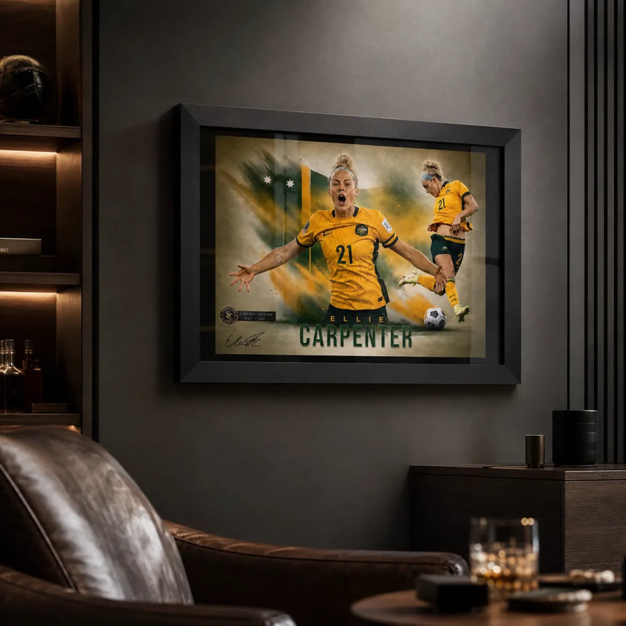 Black framed Ellie Carpenter Matildas soccer wall art displayed in a dark sports lounge with leather seating.