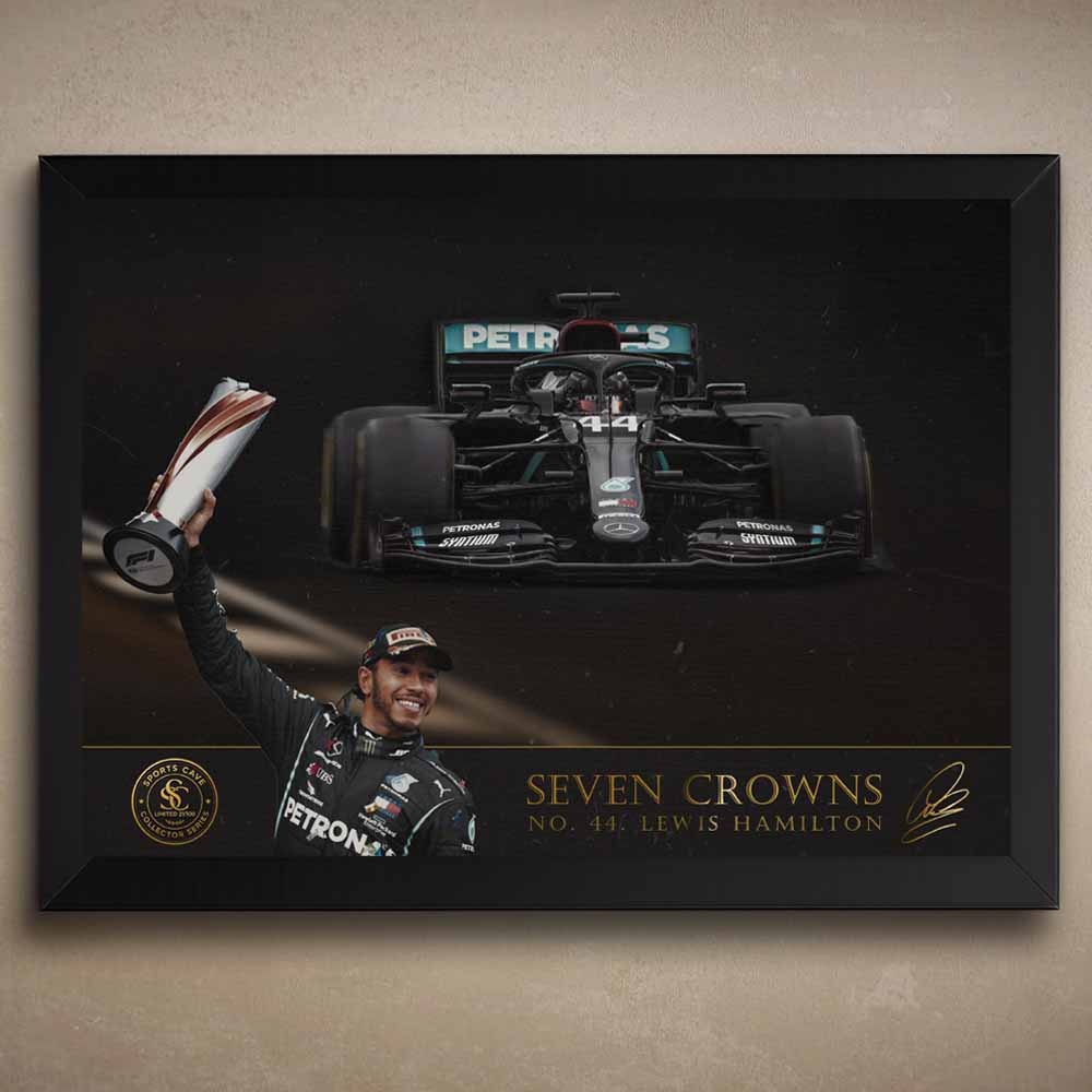 Framed formula One poster of a Lewis Hamilton Formula 1 car with 'Seven Crowns' text on a dark background.