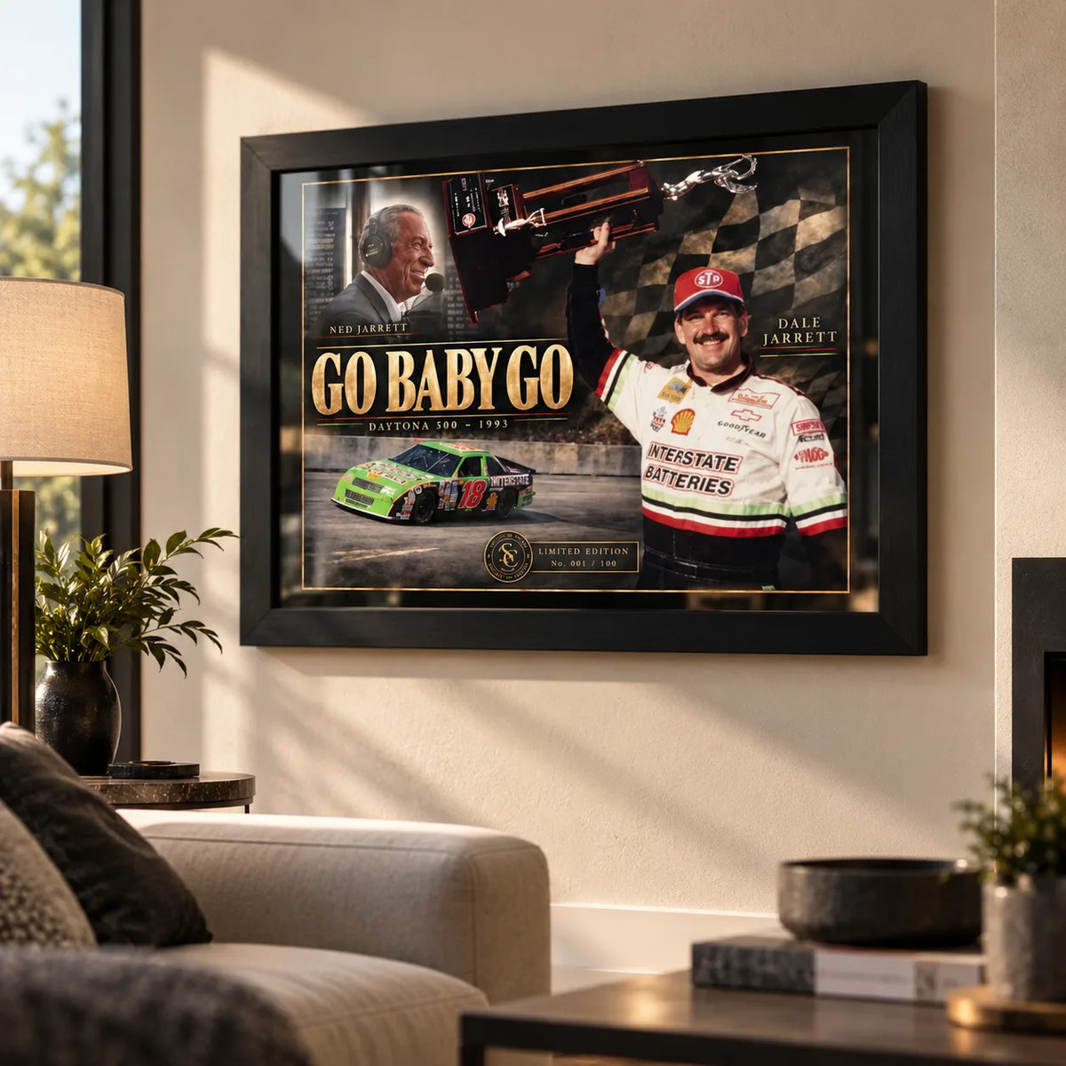 Dale and Ned Jarrett Go Baby Go NASCAR wall art displayed in a bright living room with a black frame.