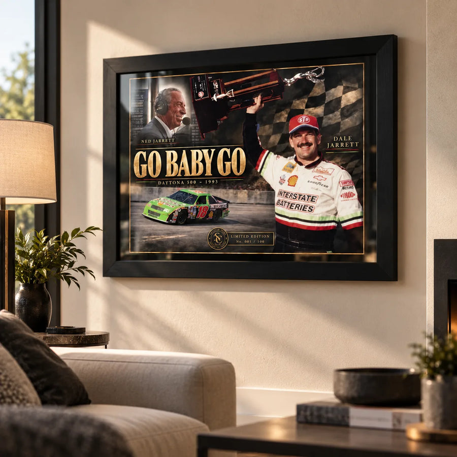 Dale and Ned Jarrett Go Baby Go NASCAR wall art displayed in a bright living room with a black frame.