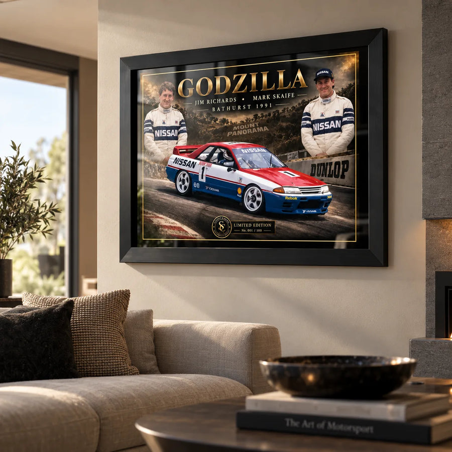 Jim Richards and Mark Skaife Godzilla wall art displayed in a contemporary living room with a black frame.