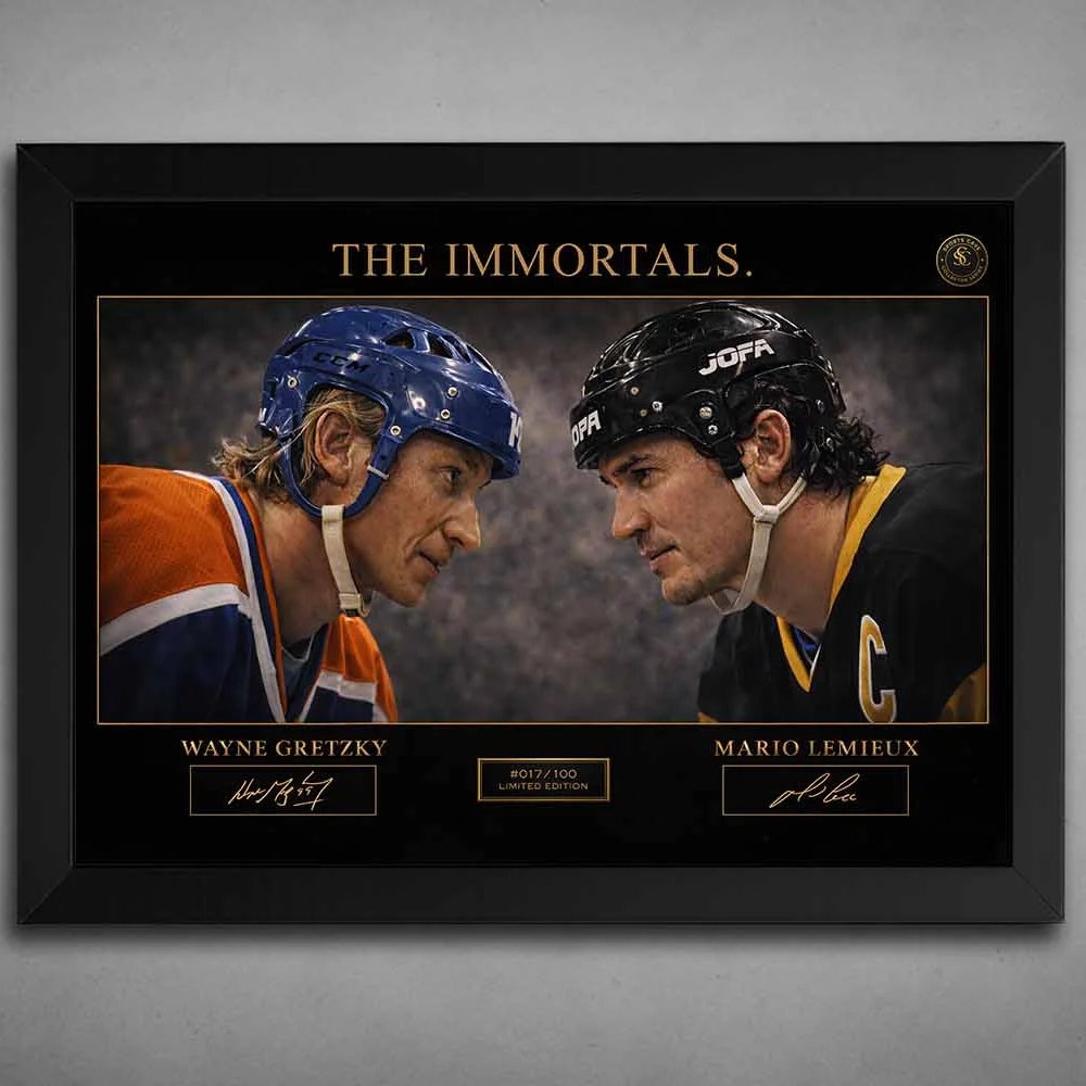 Wayne Gretzky vs. Mario Lemieux limited edition sports wall art in black frame, capturing two hockey legends in action.