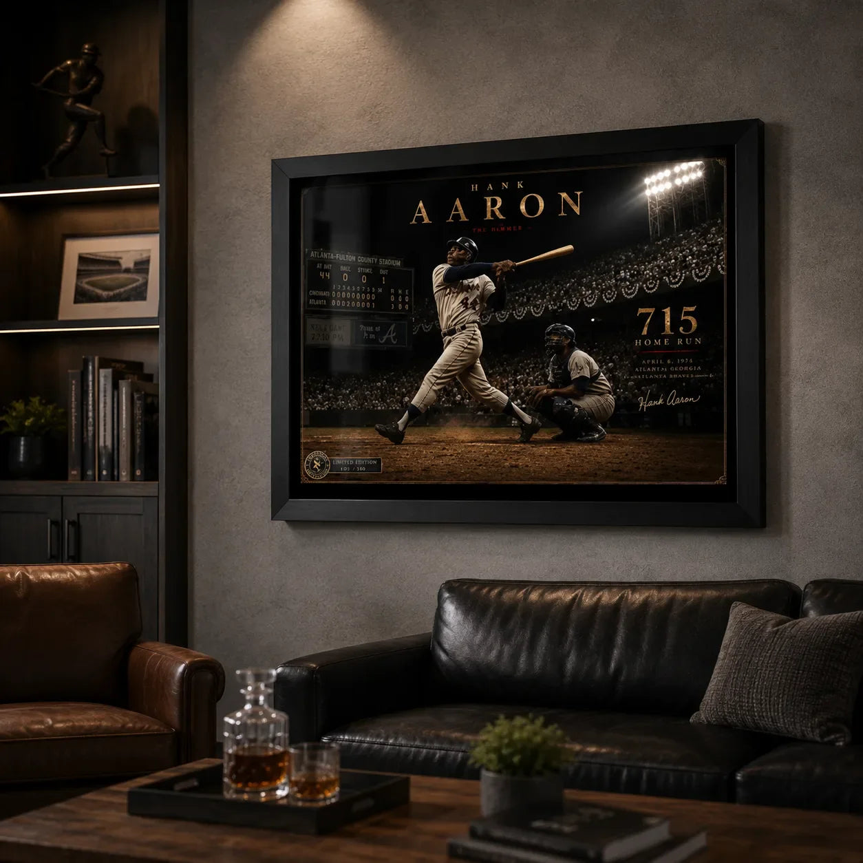 Hank Aaron 715th home run framed baseball wall art mounted in a dark premium man cave with leather seating.