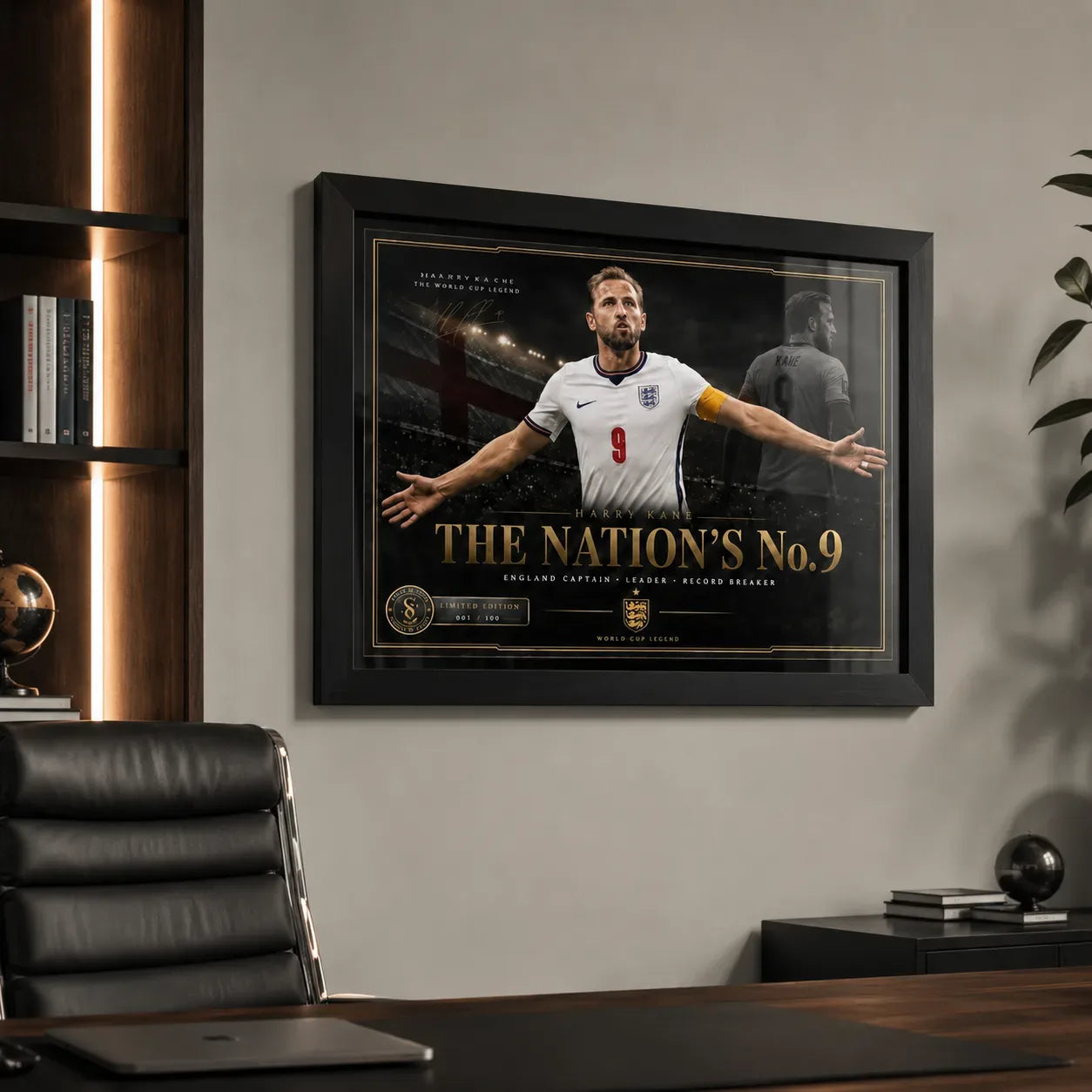 Harry Kane wall art in a black frame displayed in a modern office with timber shelving and a black leather chair.