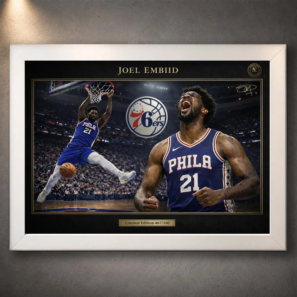 76ers basketball wall art shown in a white frame with black matting on a grey wall.