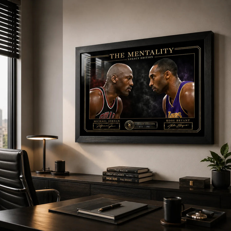 Jordan vs Bryant Legacy Edition wall art mounted in a refined office with dark timber furniture and shelving.