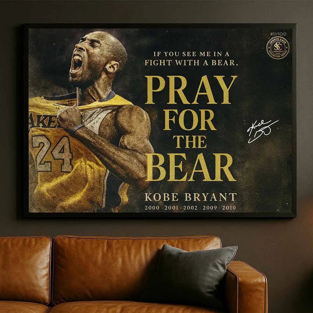 Kobe Bryant Pray For The Bear framed artwork displayed in modern man cave above leather couch.