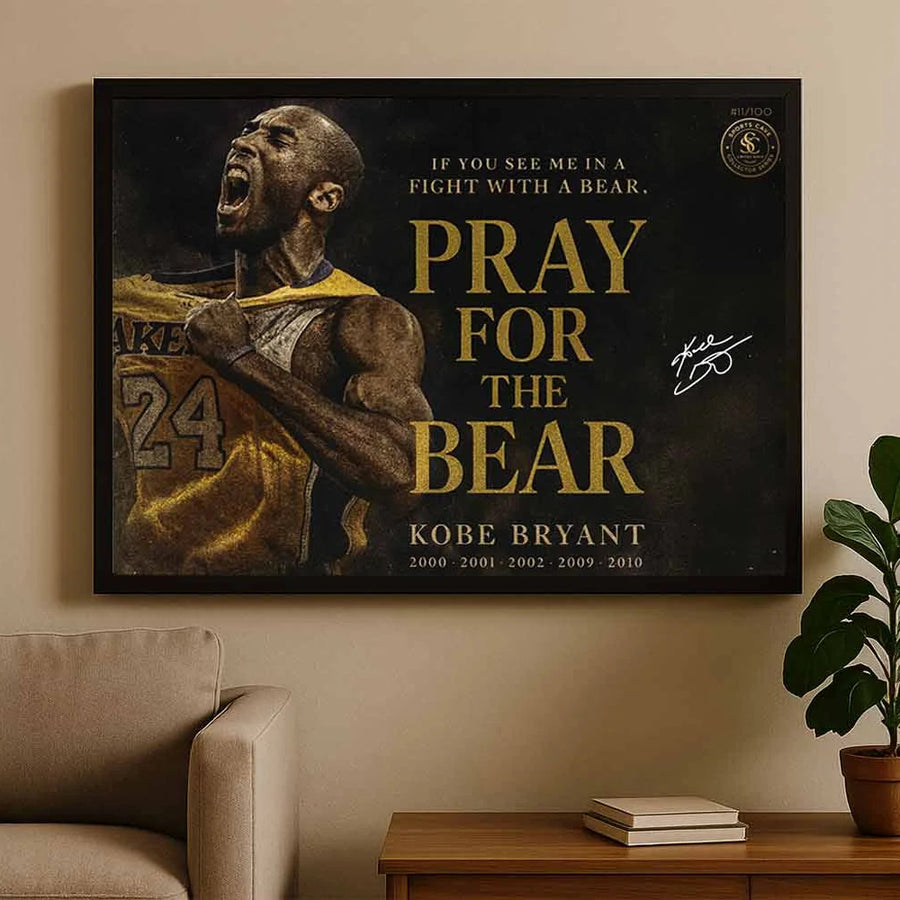 Kobe Bryant Pray For The Bear NBA sports wall art framed in black above beige sofa in modern living room.
