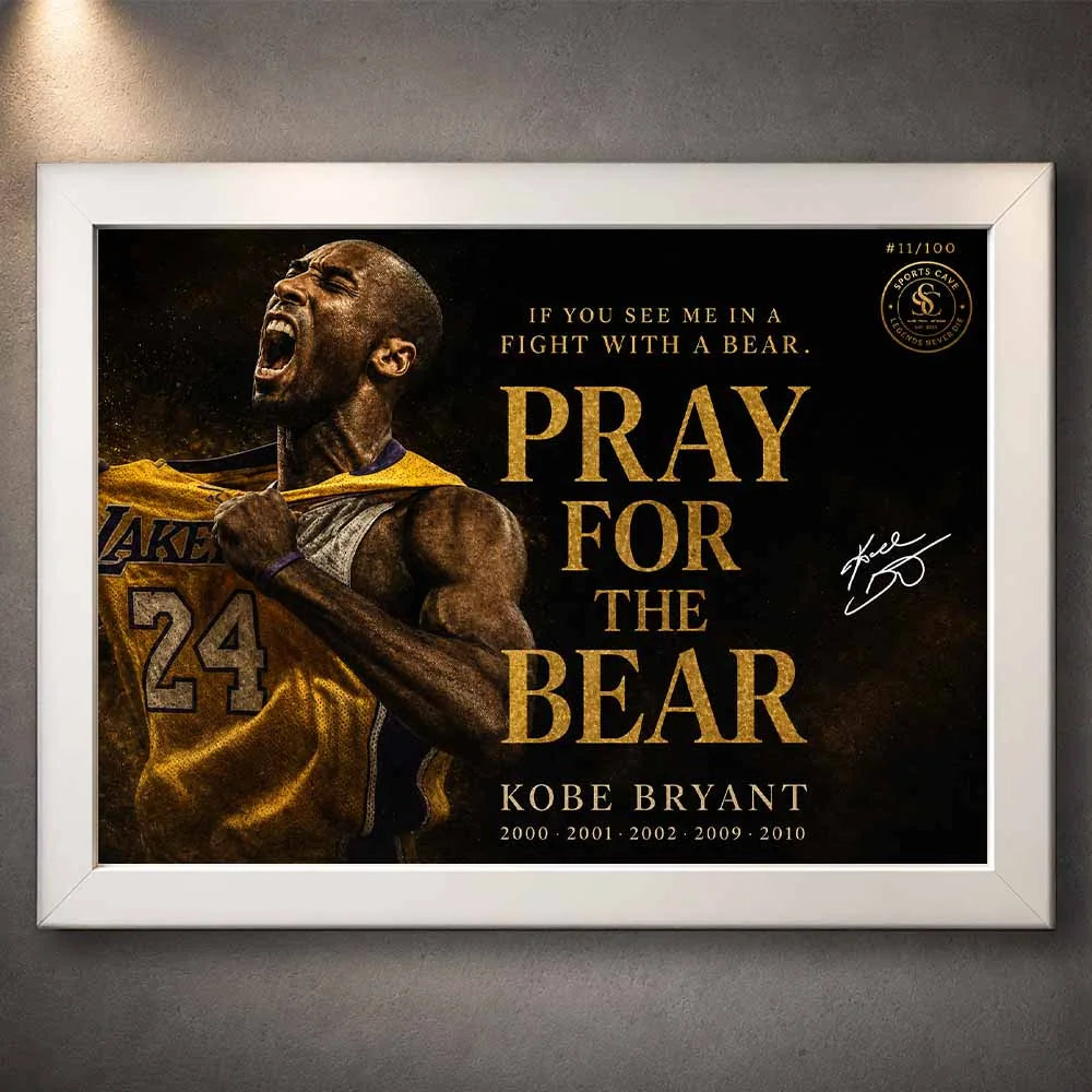 Kobe Bryant Pray For The Bear NBA sports wall art in white frame on textured wall.