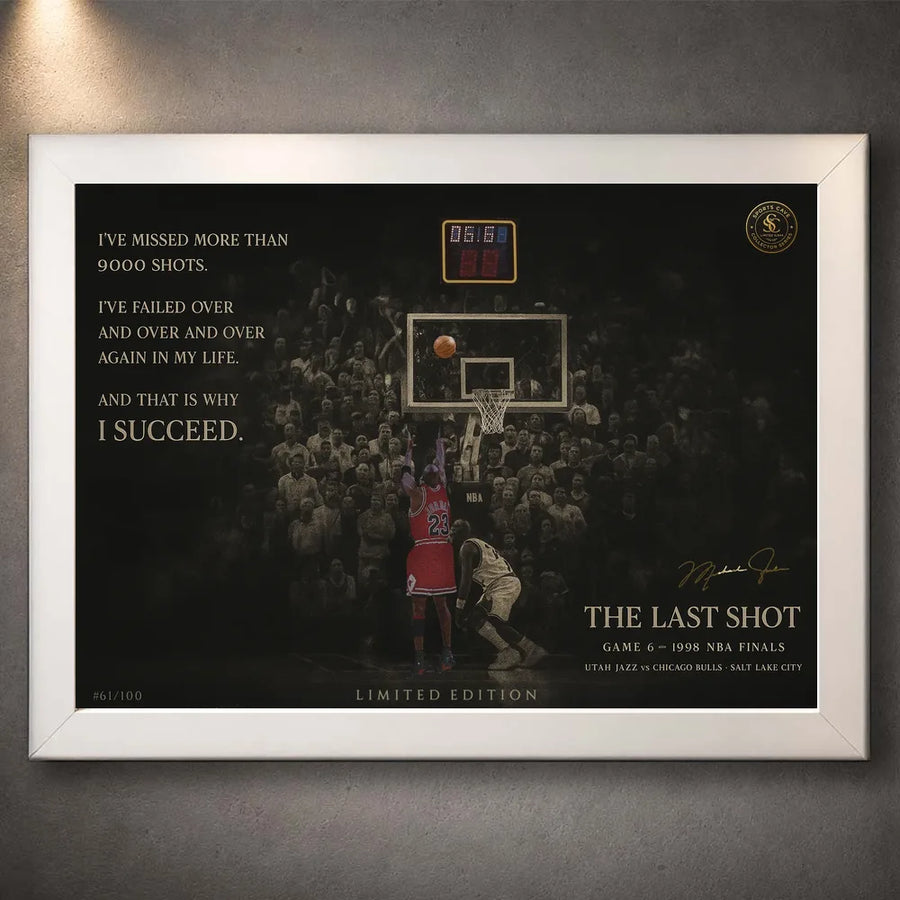 Last shot basketball wall art displayed in a white frame on a textured grey wall.
