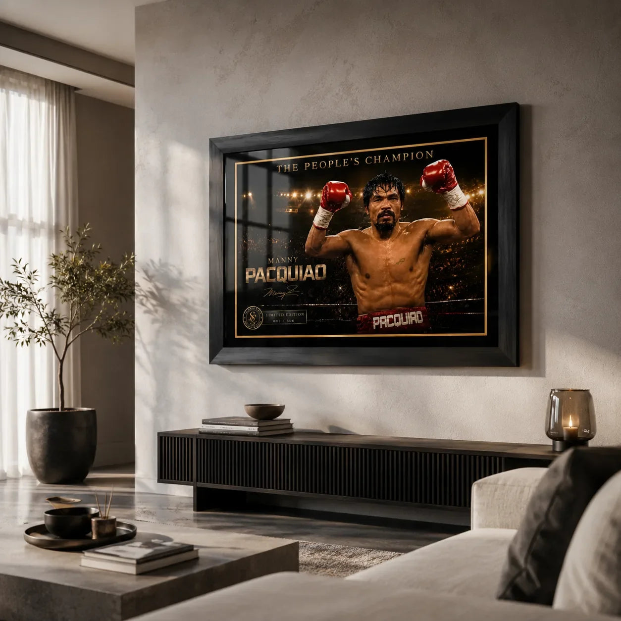 Manny Pacquiao boxing wall art in a black frame above a console in a bright modern living room with soft natural light.