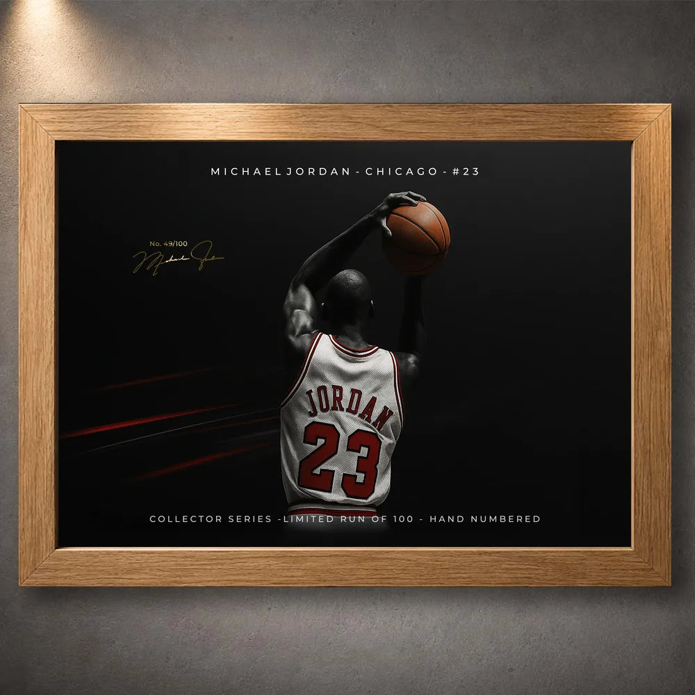 Oak framed Michael Jordan wall art showing Chicago No. 23 artwork on a dark grey wall.