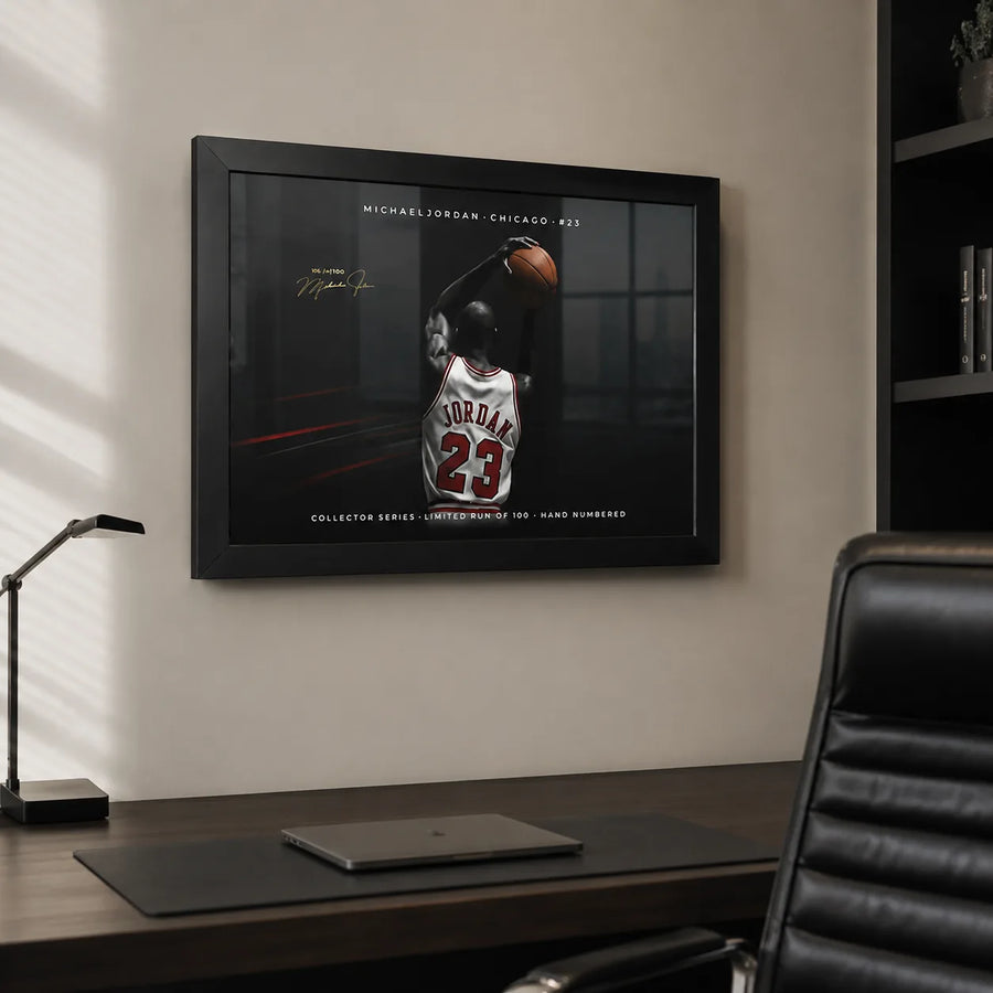 Michael Jordan Chicago 23 wall art in a black frame displayed above a modern office desk.