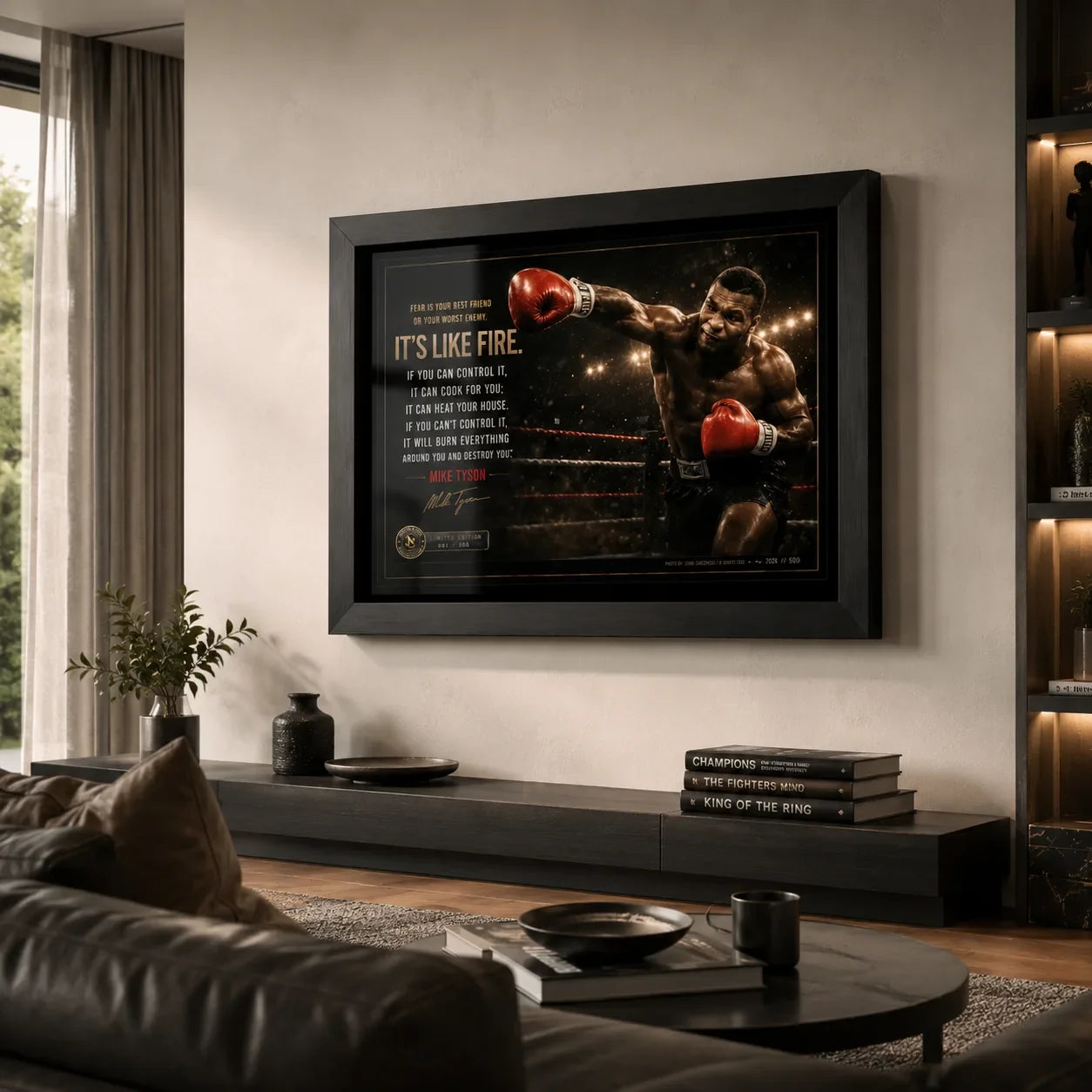 Mike Tyson boxing wall art in a black frame displayed in a premium living room above a low console and leather seating.