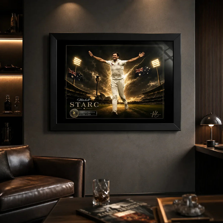 Mitchell Starc cricket wall art in a black frame displayed in a dark premium man cave with warm lighting.