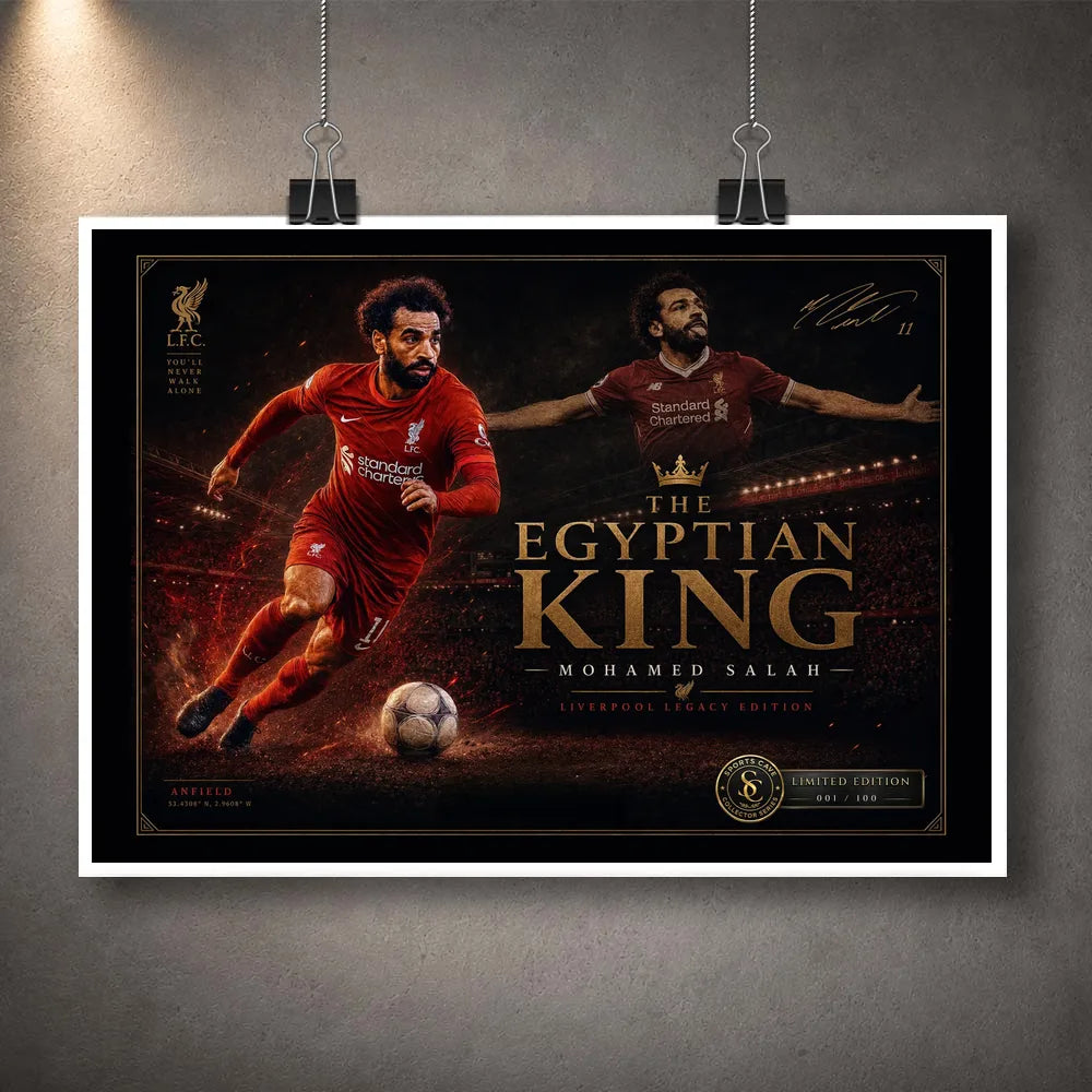 Unframed Mohamed Salah football print displayed with a clean white border and hanging clips on a grey wall.