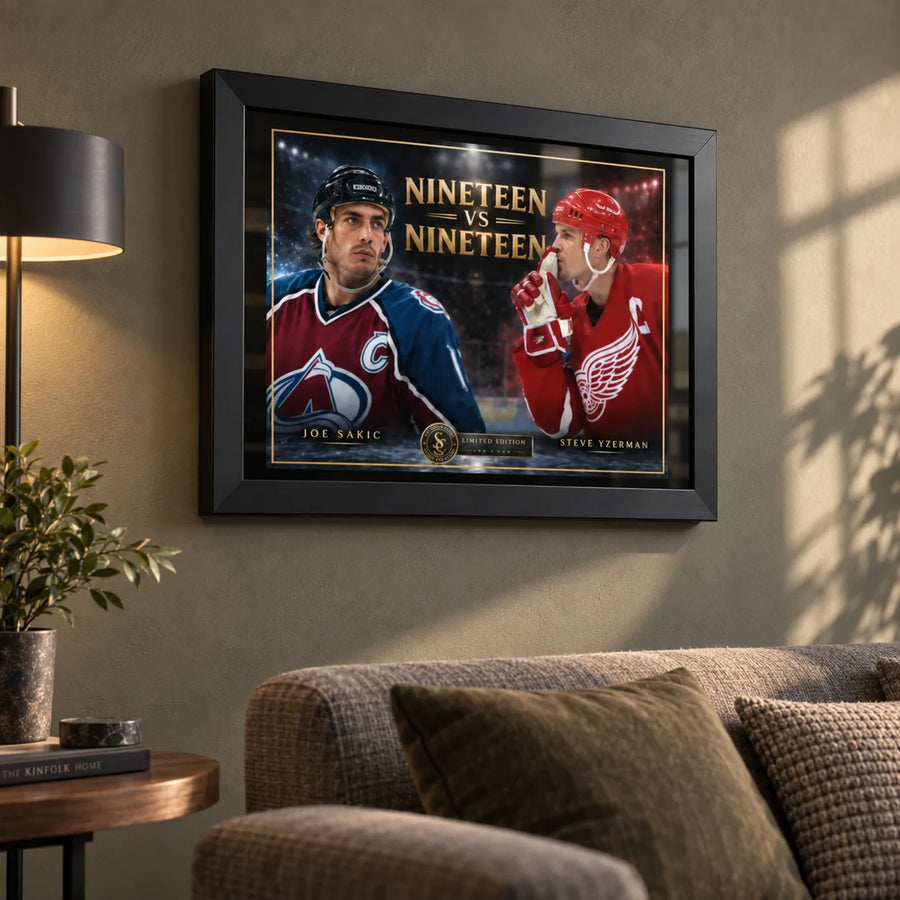 Joe Sakic and Steve Yzerman hockey wall art in a warm living room, shown in a black frame above a sofa.