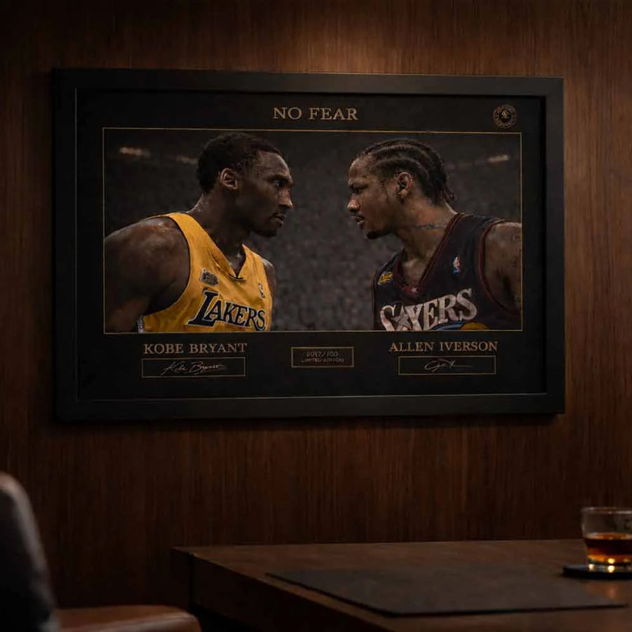 Premium framed sports memorabilia featuring the No Fear Bryant vs Iverson artwork displayed in an executive office environment.