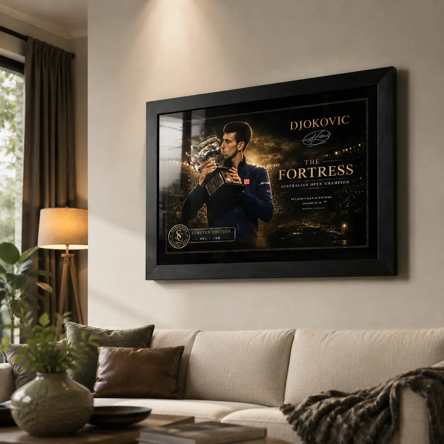 Novak Djokovic framed tennis wall art displayed in a warm living room above a sofa with premium collector styling.