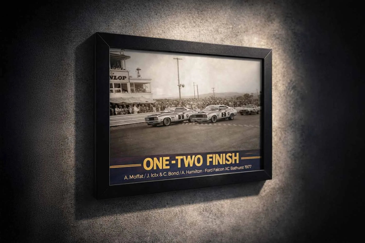 Limited edition Bathurst 1977 motorsport wall art framed in black, featuring the iconic Ford Falcon XC one-two finish, premium collector print by Sports Cave.