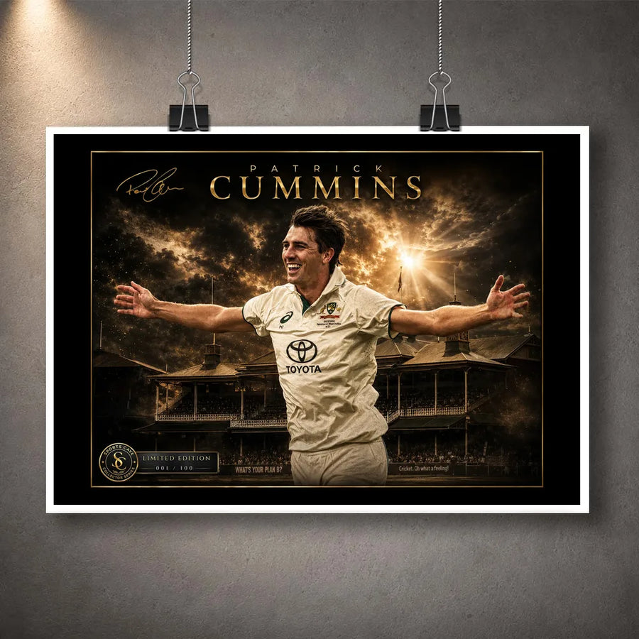 Unframed Pat Cummins The Captain’s Roar cricket wall art print displayed with clips against a textured grey wall.