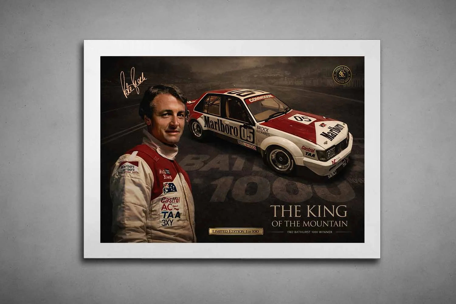 White-framed Peter Brock Bathurst 1000 Holden Commodore artwork, framed sports art mockup on grey studio wall.